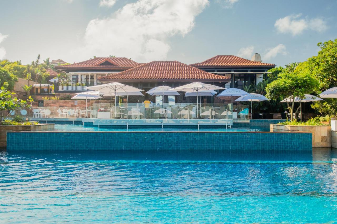 Hotel The Capital Zimbali à Ballito Extérieur photo The swimming pool at the resort