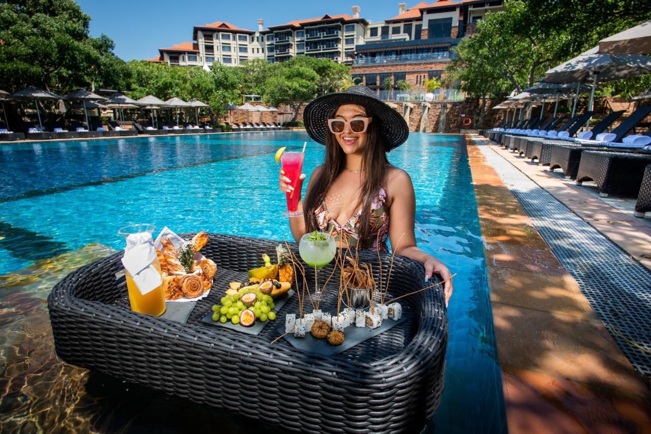 Hotel The Capital Zimbali à Ballito Extérieur photo Poolside at the hotel